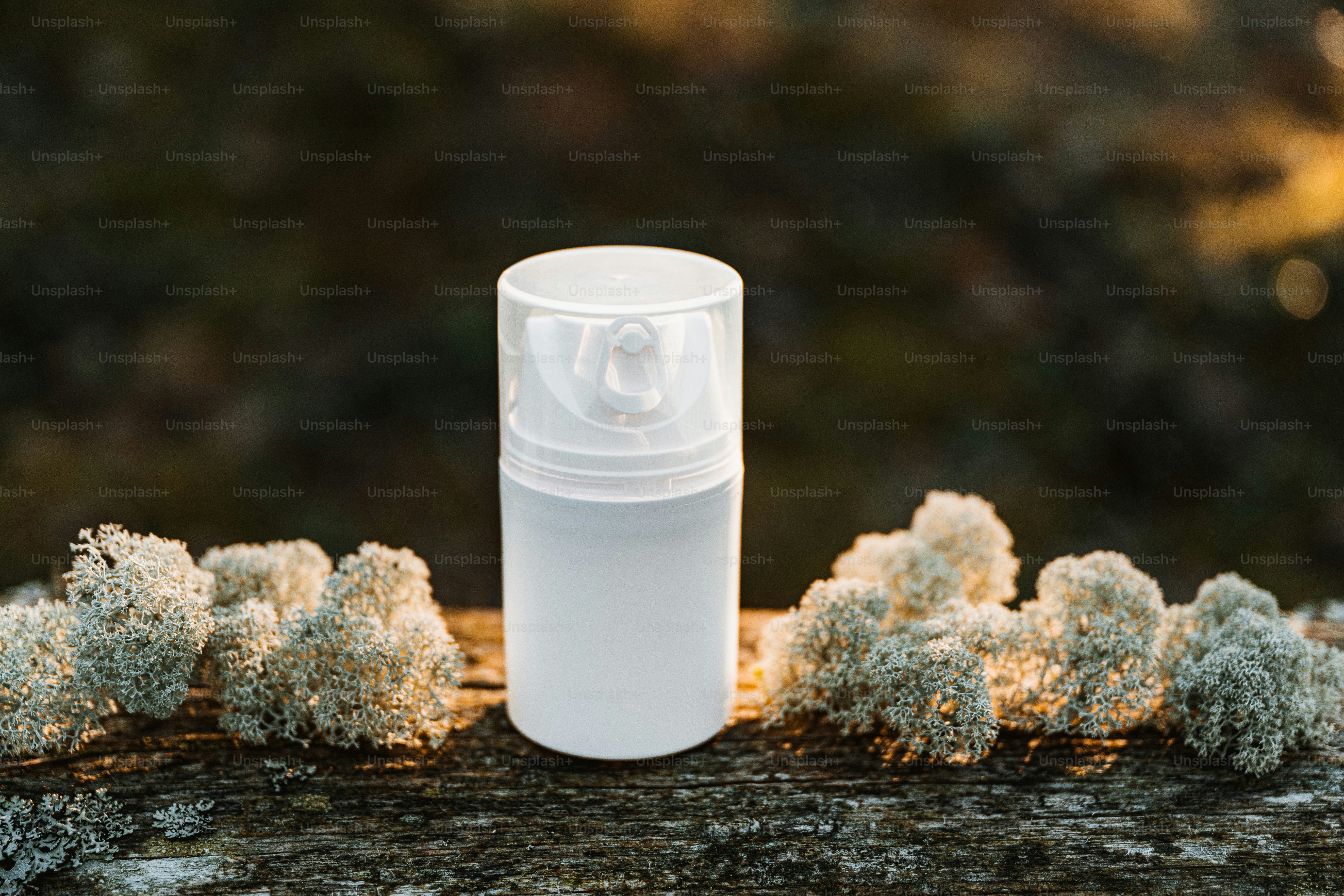 a white container sitting on top of a wooden table